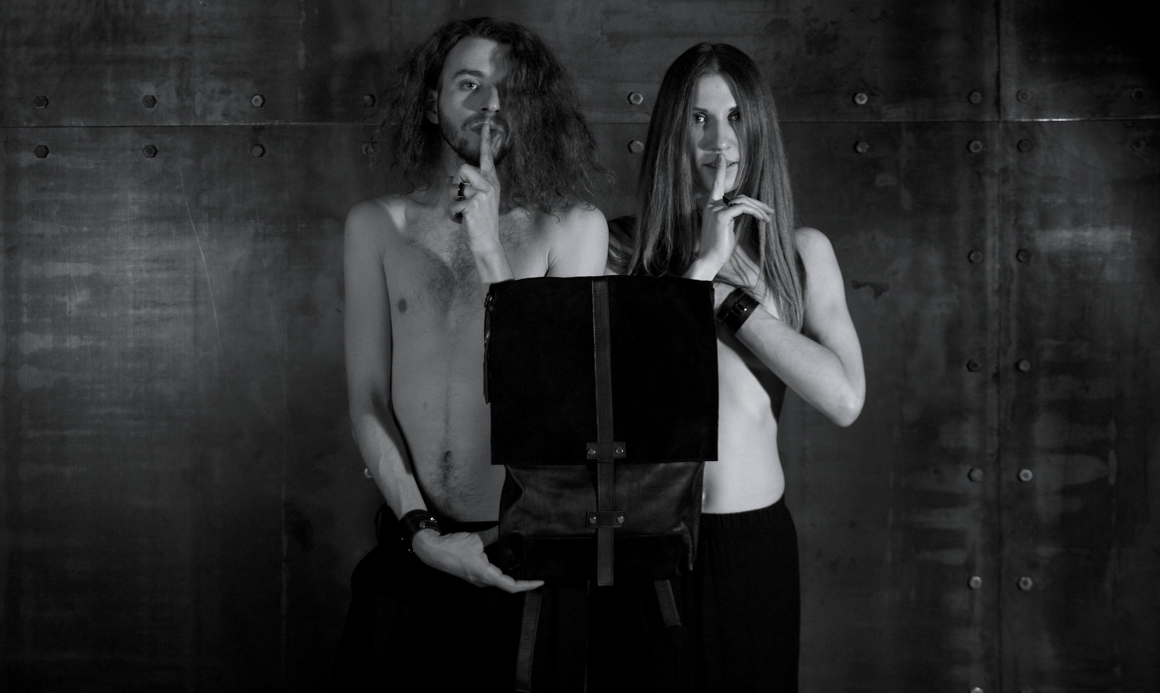 Infinite Whirling Suede Backpack